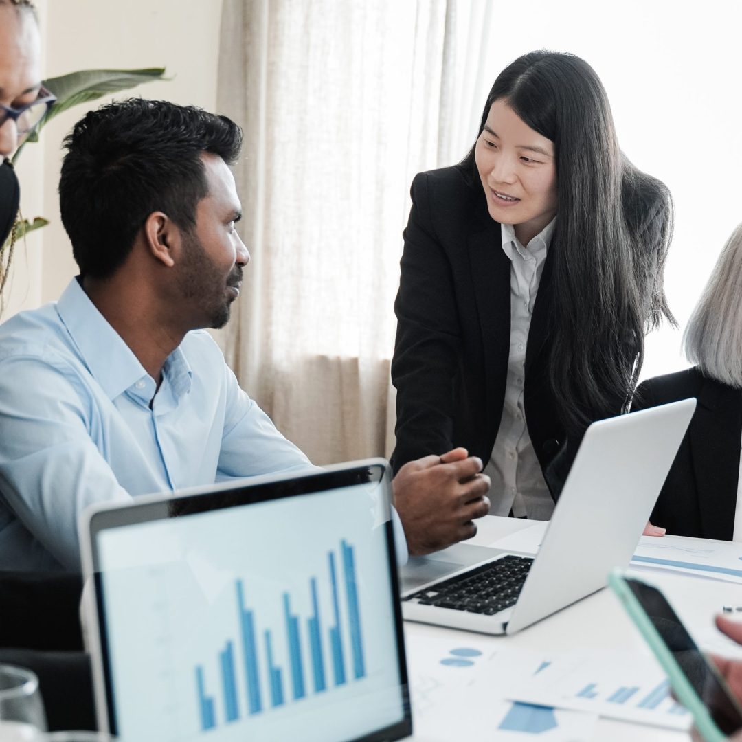 Multiracial business people working together inside modern bank office - Focus on asian girl face